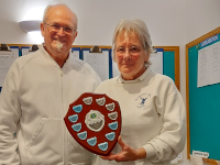 Sue Hanlon receiving the Phil Frost trophy